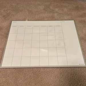 Calendar whiteboard with marker holder